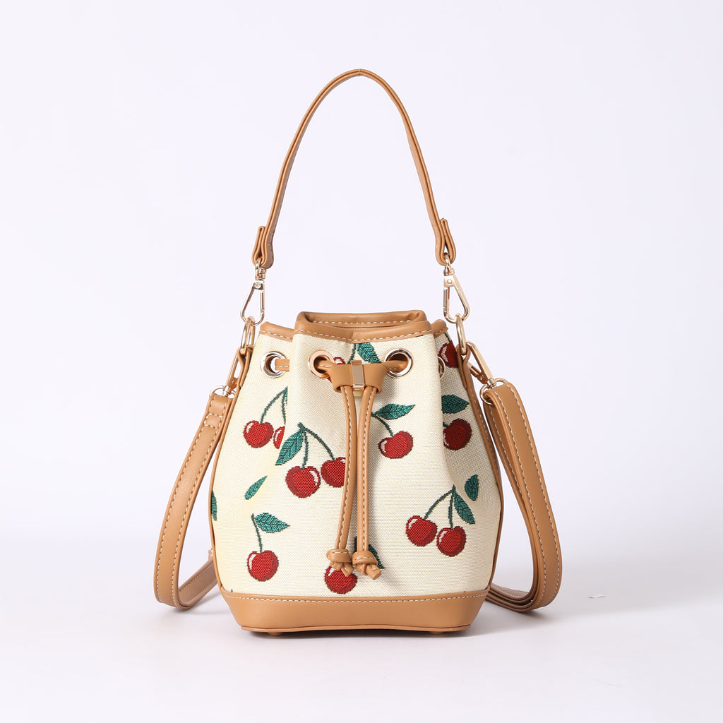 Signare London - Cherry Bucket Handbag in Cream Backdrop