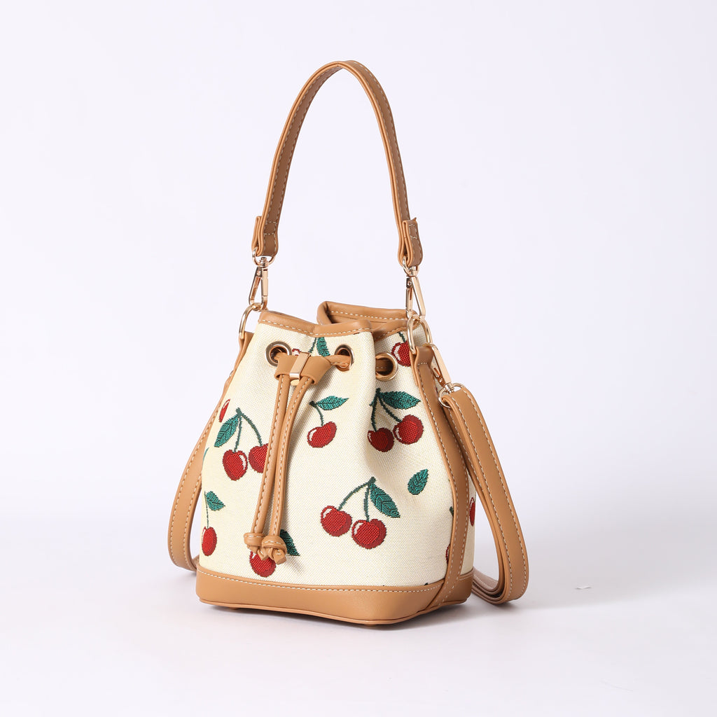 Signare London - Cherry Bucket Handbag in Cream Backdrop