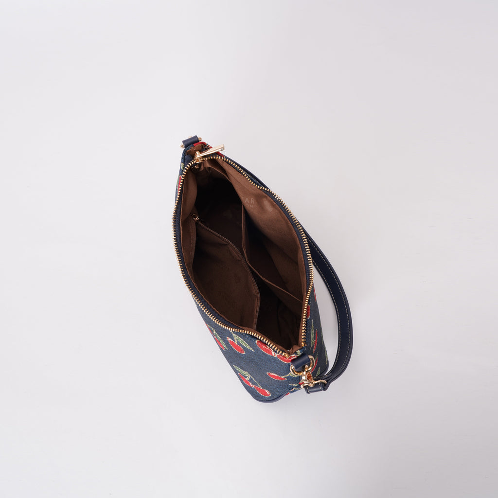 Signare London - Cherry Moon Handbag on Blue Backdrop