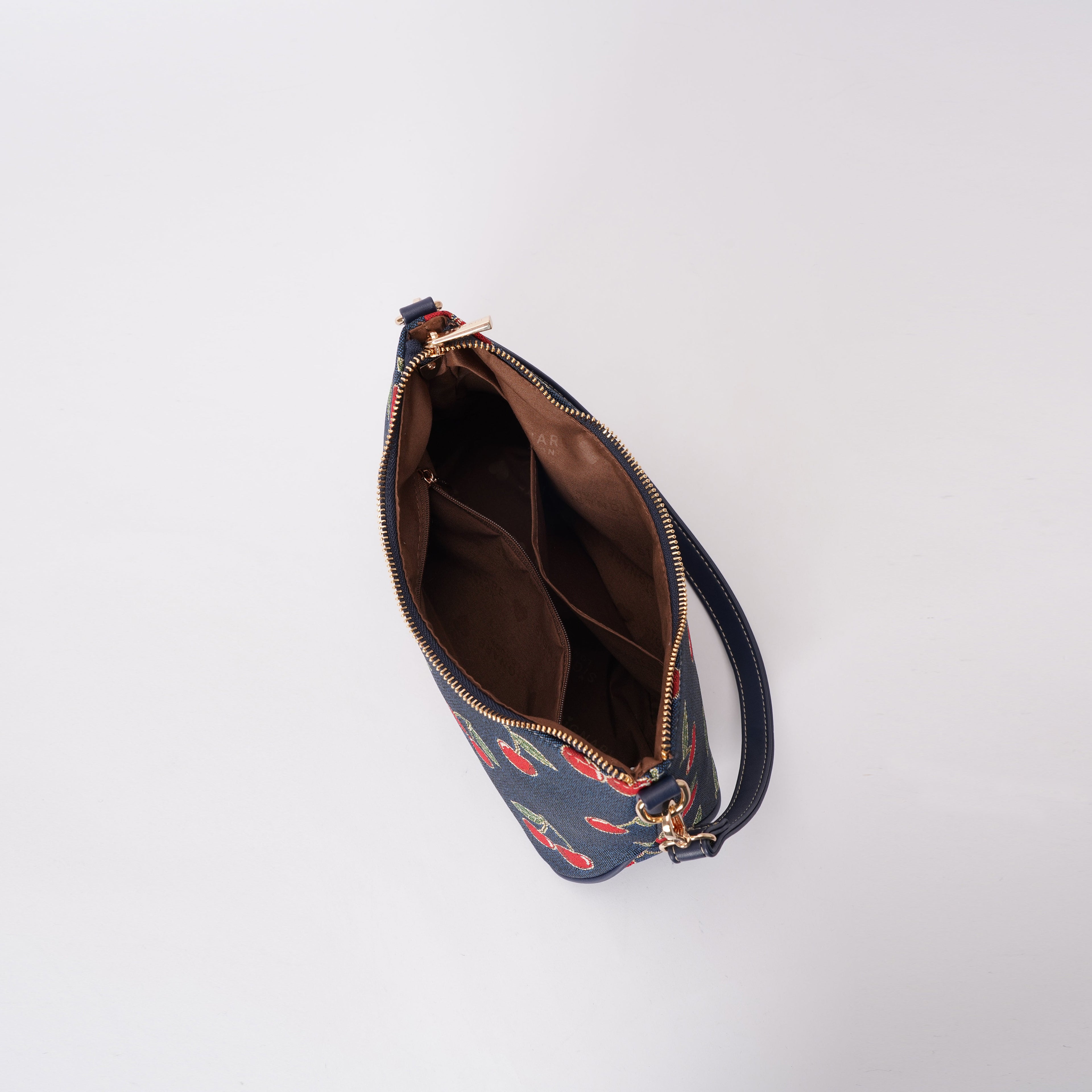 Signare London - Cherry Moon Handbag on Blue Backdrop